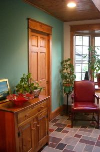 light, cool paint and stain colors are perfect for this sunroom